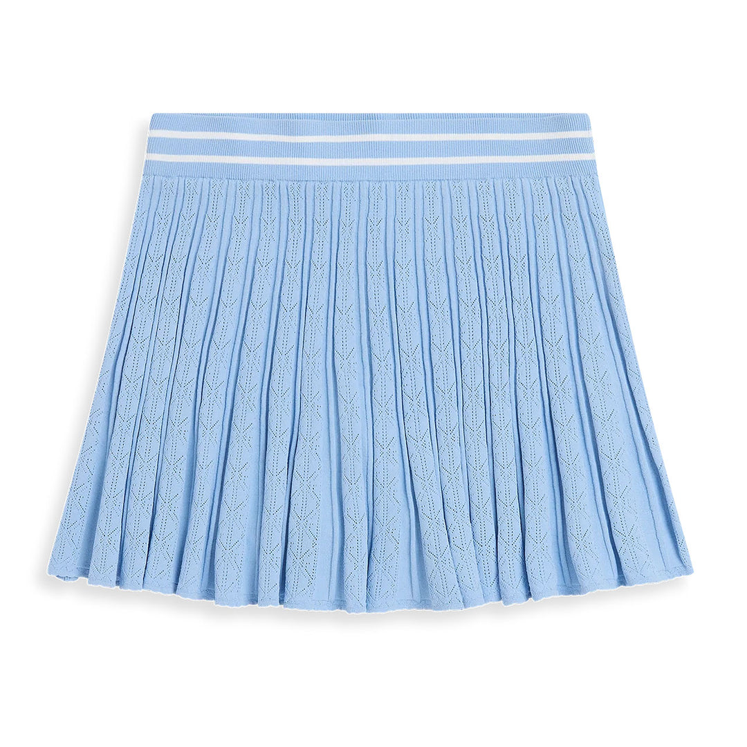 Greyson Pointelle Skirt for women featuring luxurious pointelle knit fabric, built-in shorts, and a flattering performance silhouette for golf and tennis.