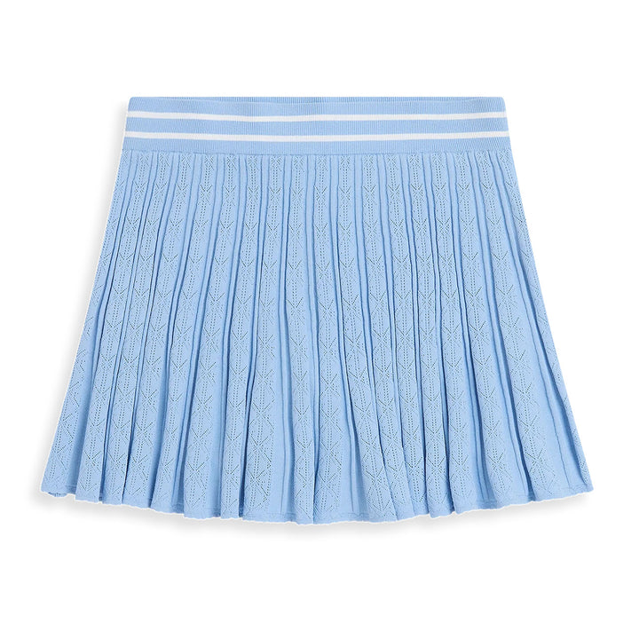 Greyson Pointelle Skirt for women featuring luxurious pointelle knit fabric, built-in shorts, and a flattering performance silhouette for golf and tennis.